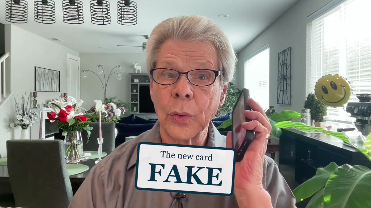 Rob Fore with a stamp reading The new card: FAKE