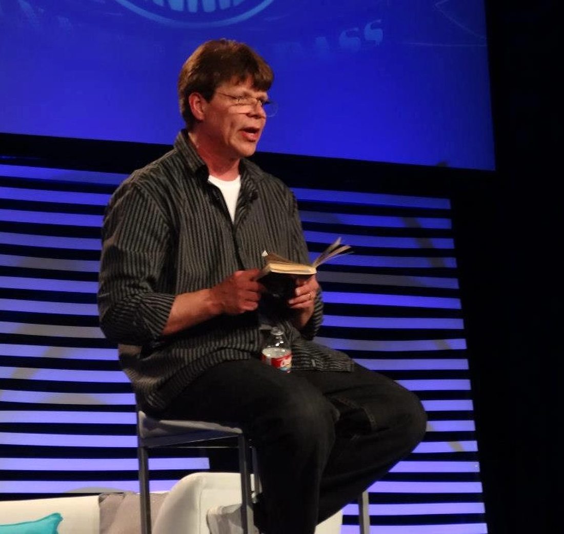 Rob Fore teaching from stage